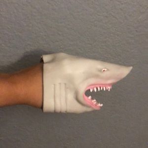 Grey hand toy shark